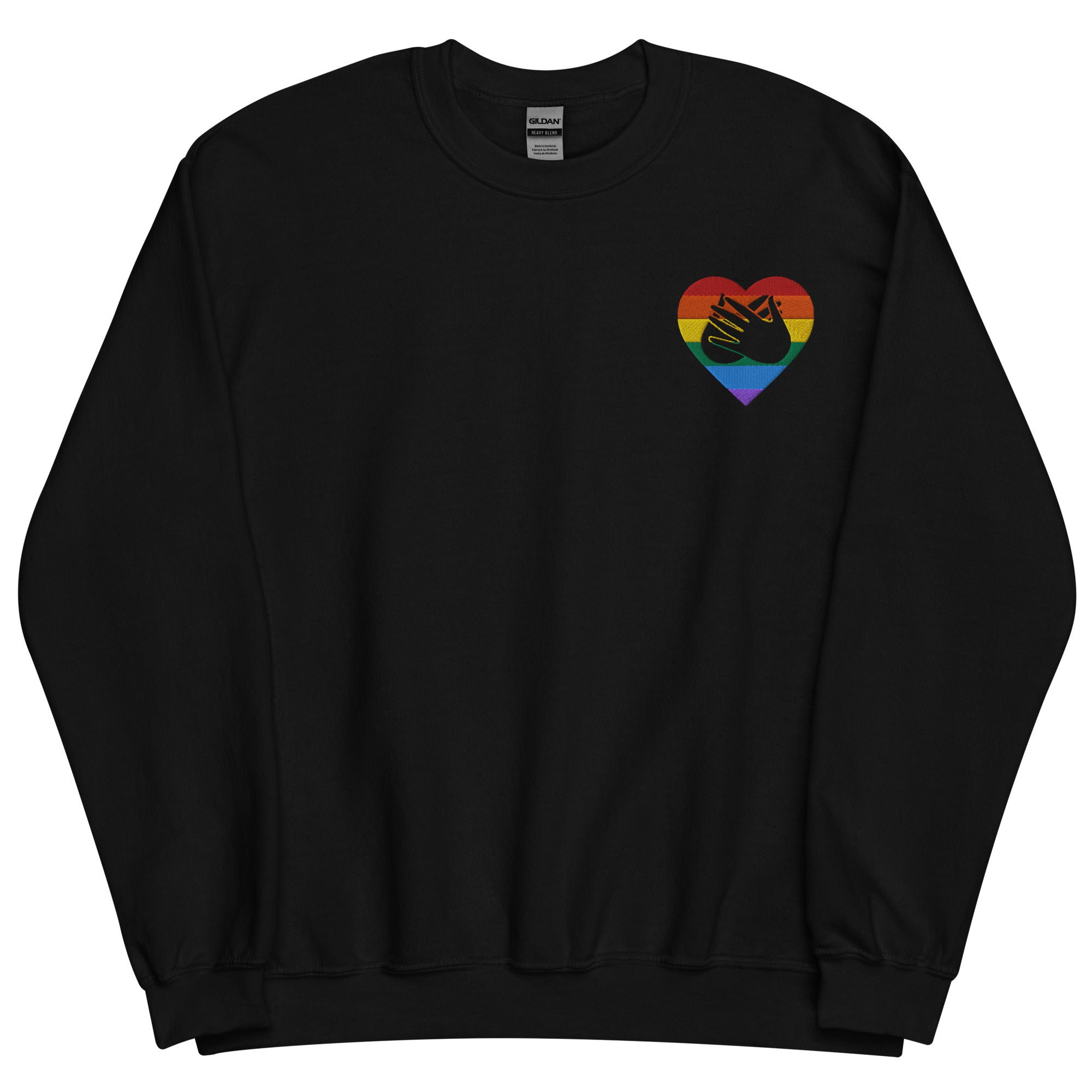 Front view of a black sweatshirt showing a pride coloured heart and the iconic BSL Love sign embedded in it on the left side of the chest