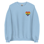 Front view of a light blue sweatshirt showing a pride coloured heart and the iconic ASL I Love You sign embedded in it on the left side of the chest