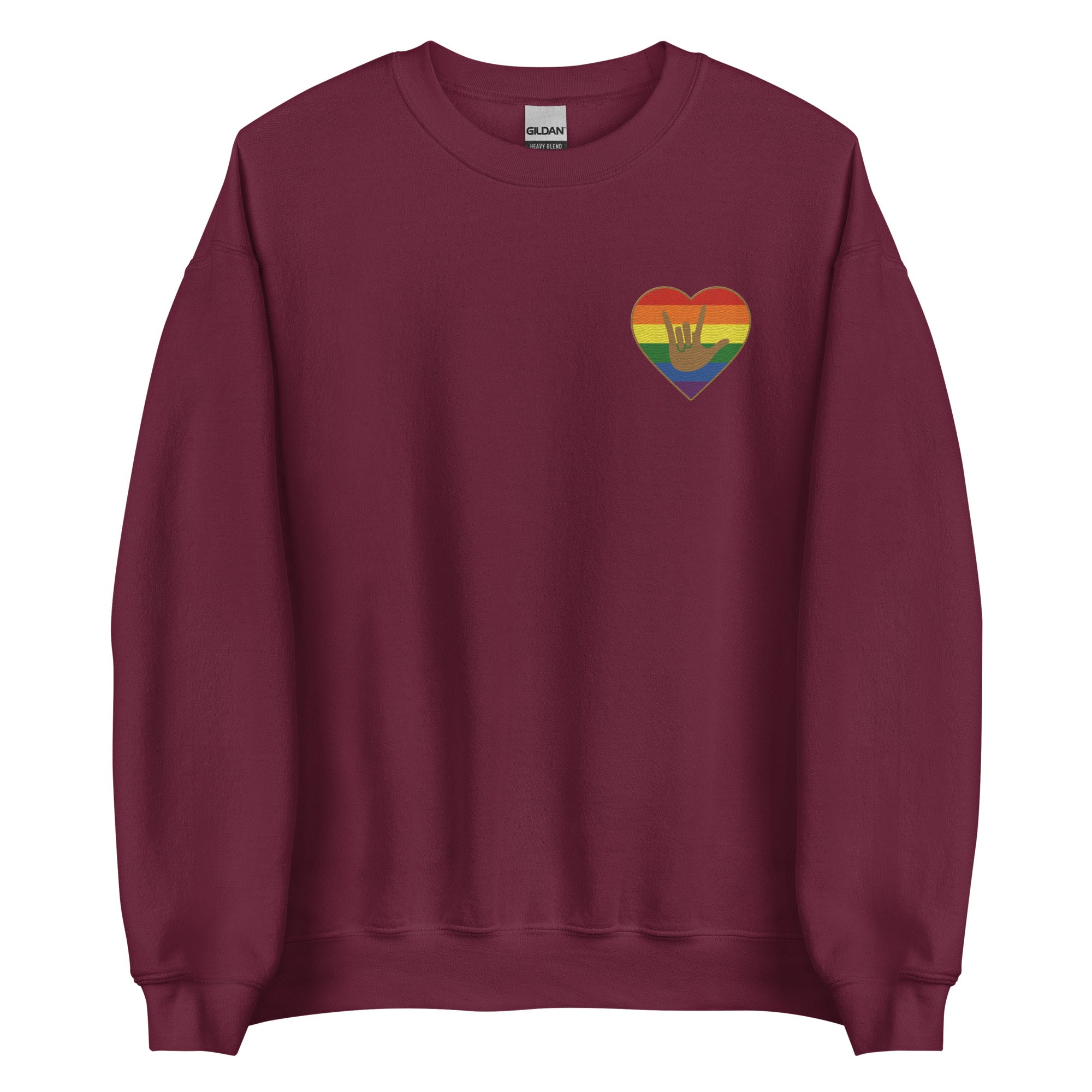 Front view of a maroon sweatshirt showing a pride coloured heart and the iconic ASL I Love You sign embedded in it on the left side of the chest