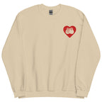 Front view of a sand sweatshirt showing a red coloured heart and the iconic BSL Love sign embedded in it on the left side of the chest