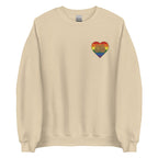 Front view of a sand sweatshirt showing a pride coloured heart and the iconic BSL Love sign embedded in it on the left side of the chest