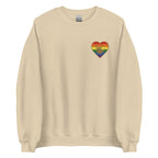Front view of a sand sweatshirt showing a pride coloured heart and the iconic ASL I Love You sign embedded in it on the left side of the chest