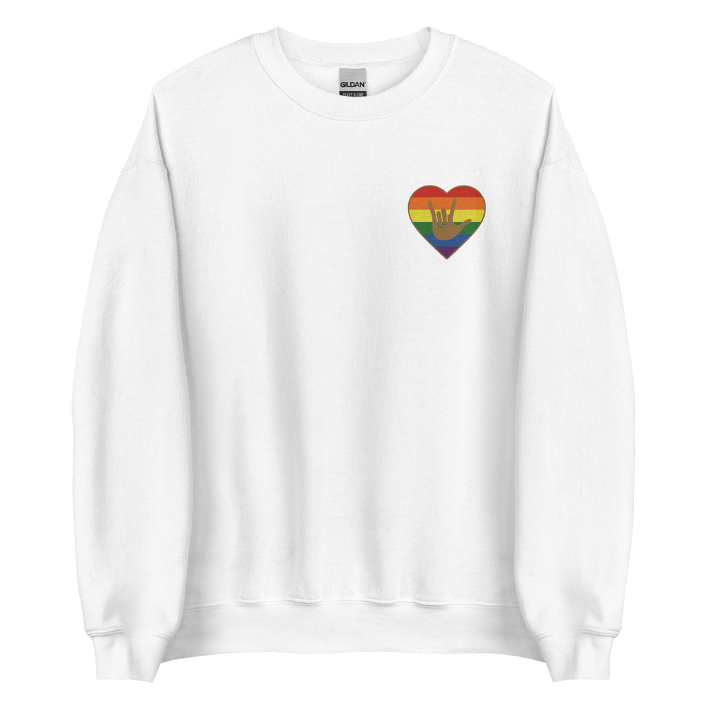 Front view of a white sweatshirt showing a pride coloured heart and the iconic ASL I Love You sign embedded in it on the left side of the chest