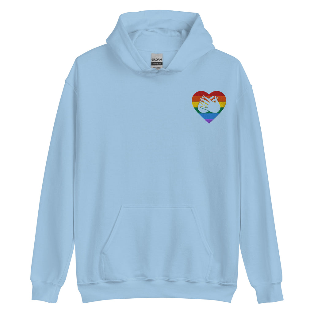 Front view of a light blue hoodie showing a pride coloured heart and the iconic BSL Love sign embedded in it on the left side of the chest