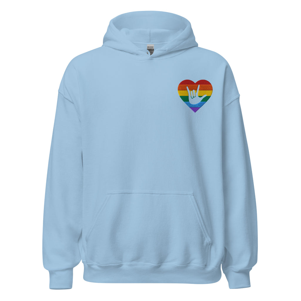 Front view of a light blue hoodie showing a pride coloured heart and the iconic ASL I Love You sign embedded in it on the left side of the chest