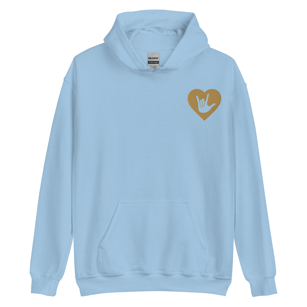 Front view of a light blue hoodie showing a gold colored heart and the iconic ASL I Love You sign embedded in it on the left side of the chest
