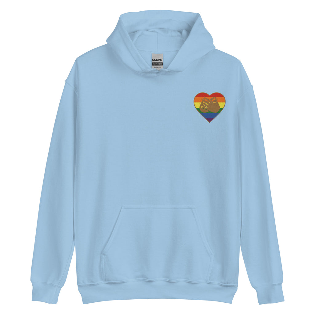 Front view of a light blue hoodie showing a pride coloured heart and the iconic BSL Love sign embedded in it on the left side of the chest
