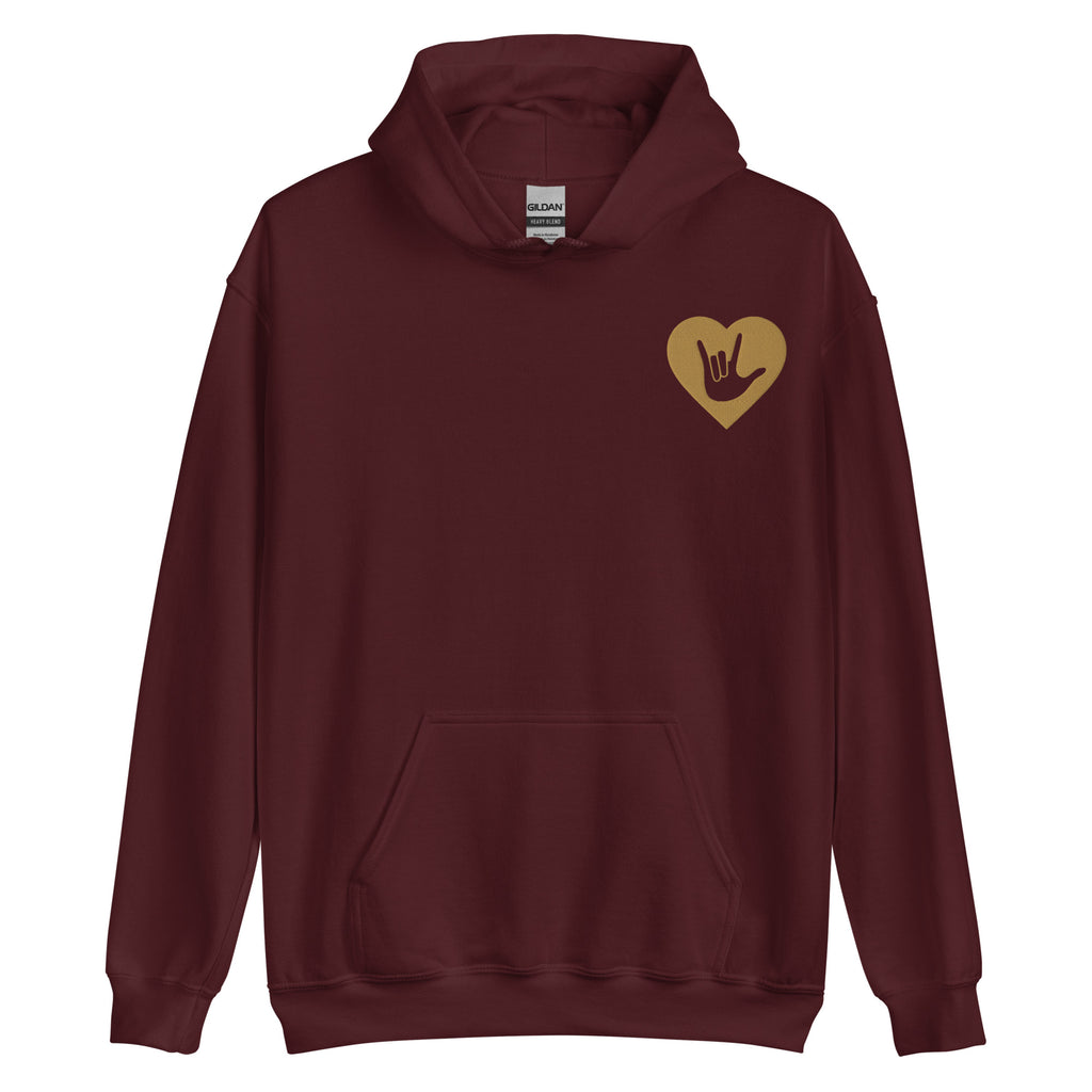 Front view of a maroon hoodie showing a gold coloured heart and the iconic ASL I Love You sign embedded in it on the left side of the chest