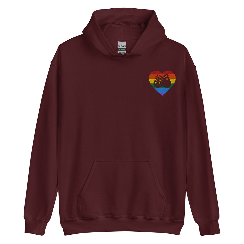 Front view of a maroon hoodie showing a pride coloured heart and the iconic BSL Love sign embedded in it on the left side of the chest