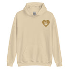 Front view of a sand hoodie showing a gold coloured heart and the iconic ASL I Love You sign embedded in it on the left side of the chest