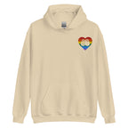 Front view of a sand hoodie showing a pride coloured heart and the iconic BSL Love sign embedded in it on the left side of the chest