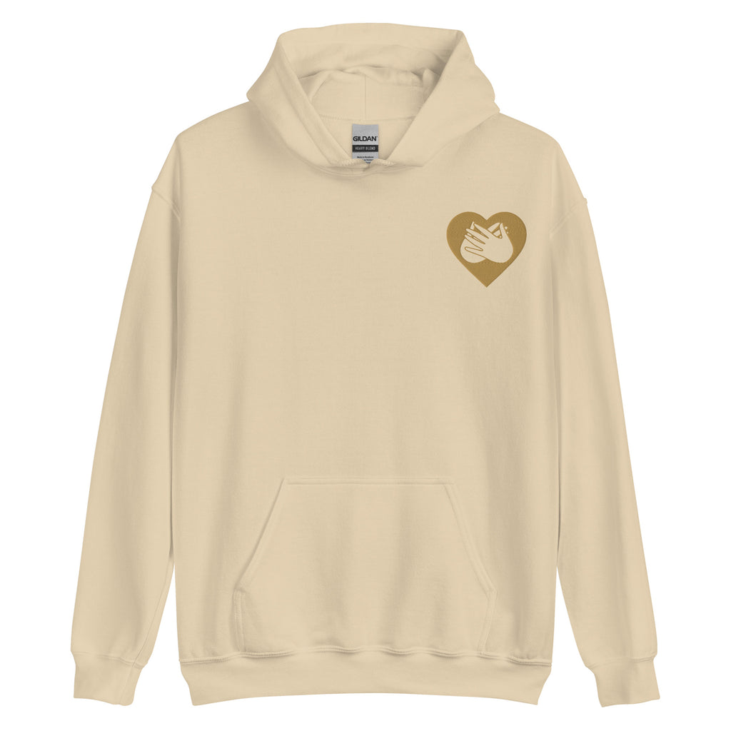Front view of a sand hoodie showing a gold coloured heart and the iconic BSL Love sign embedded in it on the left side of the chest