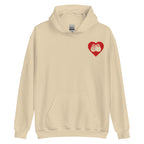 Front view of a sand hoodie showing a red coloured heart and the iconic BSL Love sign embedded in it on the left side of the chest