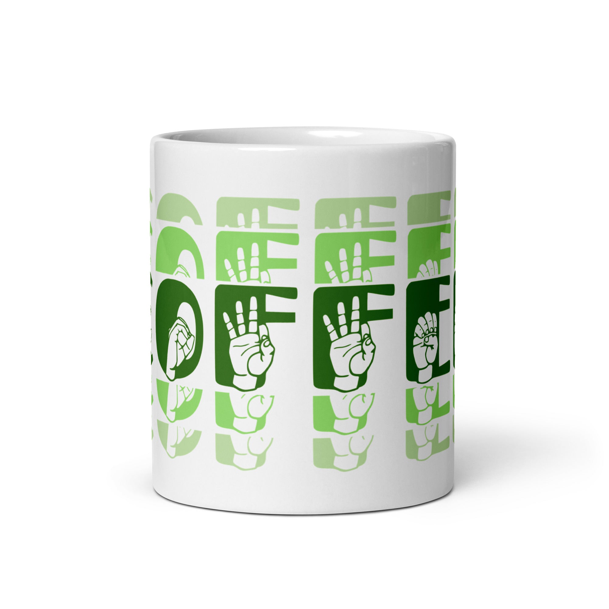 White mug with no handle visible, showing part of the phrase Coffee written in ASL Fingerspelling and Text wrapping around the mug in green cutaway design.