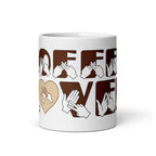 White mug featuring the phrase Coffee Lover written in BSL Fingerspelling and Text wrapping around the mug in brown.
