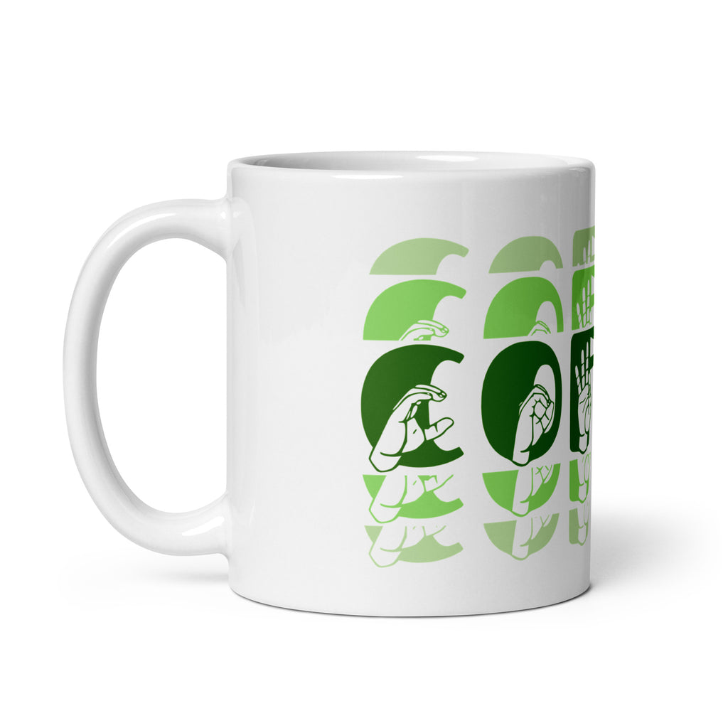 White mug featuring the phrase Coffee written in ASL Fingerspelling and Text wrapping around the mug in green cutaway design. The mug handle is on the left hand side of the mug.