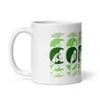 White mug featuring the phrase Coffee written in ASL Fingerspelling and Text wrapping around the mug in green cutaway design. The mug handle is on the left hand side of the mug.