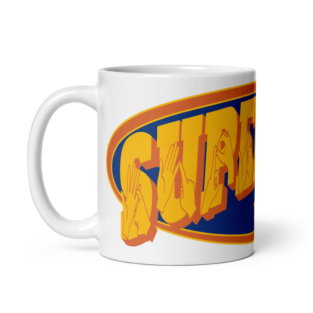 A white mug with the handle on the left showing a Supermom BSL design