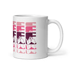 White mug featuring the phrase Coffee written in BSL Fingerspelling and Text wrapping around the mug in pink cutaway design. The mug handle is on the right hand side of the mug.