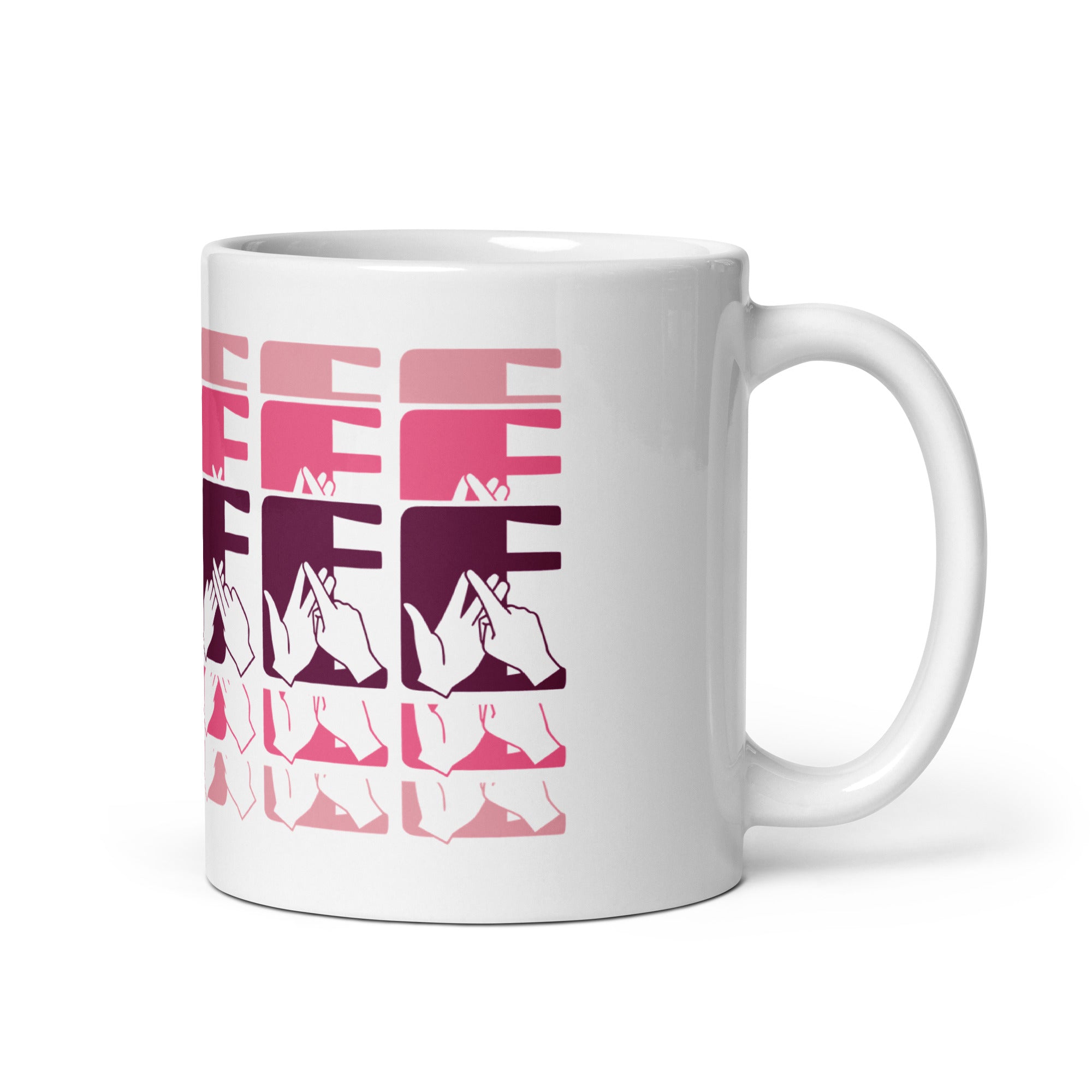 White mug featuring the phrase Coffee written in BSL Fingerspelling and Text wrapping around the mug in pink cutaway design. The mug handle is on the right hand side of the mug.