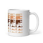 White mug featuring the phrase Coffee written in BSL Fingerspelling and Text wrapping around the mug in brown cutaway design. The mug handle is on the right hand side of the mug.