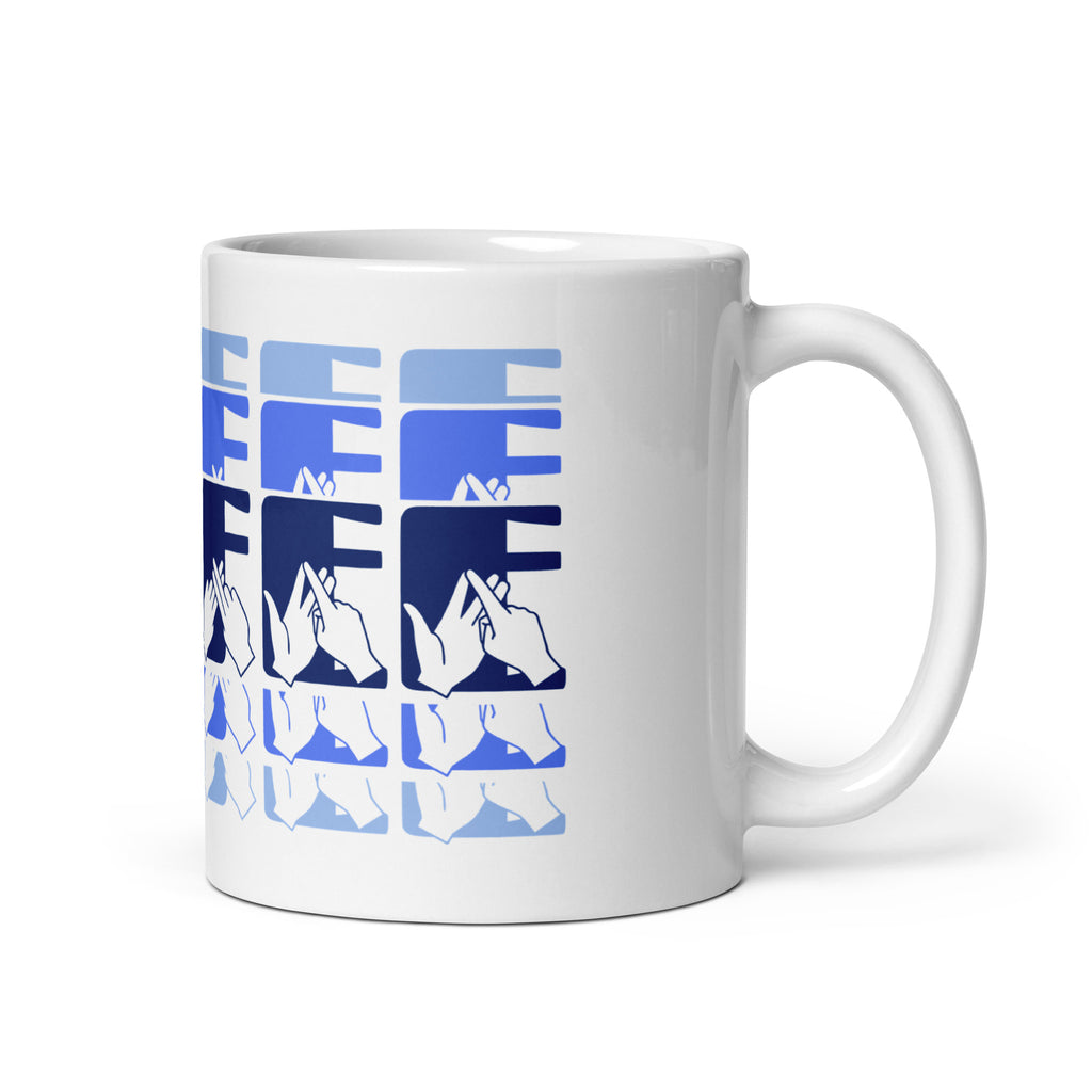 White mug featuring the phrase Coffee written in BSL Fingerspelling and Text wrapping around the mug in blue cutaway design. The mug handle is on the right hand side of the mug.