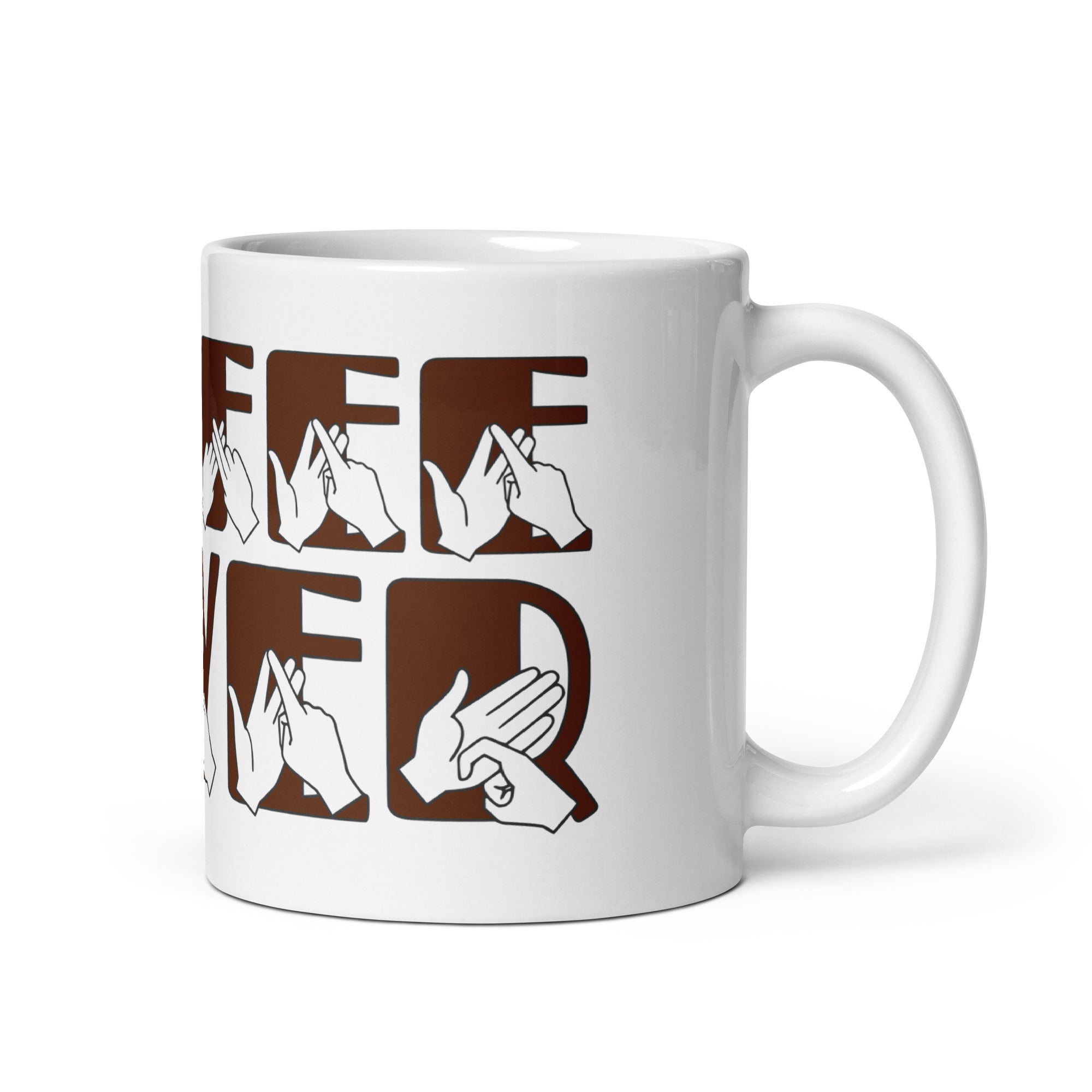 White mug featuring the phrase Coffee Lover written in BSL Fingerspelling and Text wrapping around the mug in brown. The mug handle is on the right hand side of the mug.