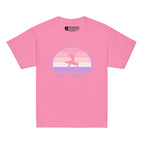 Azalea t-shirt with the phrase "Just a Girl Who Loves Dancing" above a colourful retro sunset and a silhouette of a girl dancing in the centre