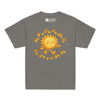 Charcoal kids' t-shirt with a cheerful sunshine character and the phrase "summer vibes" in bold BSL fingerspelling handshapes, in a lightly textured style.