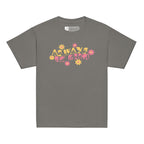 Front view of a charcoal T-shirt featuring the phrase 'Always Be Kind' in a combination of BSL fingerspelling and text, accented with a delicate floral design.