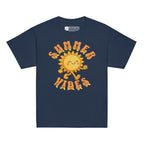 Navy kids’ t-shirt with a smiling cartoon sunshine and the phrase “summer vibes” in bold textured font, each letter showing British Sign Language fingerspelling underneath.