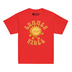 Red kids’ t-shirt with a smiling cartoon sunshine and the phrase “summer vibes” in bold textured font, each letter showing British Sign Language fingerspelling underneath.