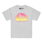 Sport grey t-shirt with the phrase "Just a Girl Who Loves Football" in BSL Fingerspelling featuring a colourful retro sunset and a silhouette of a boy kicking a football.