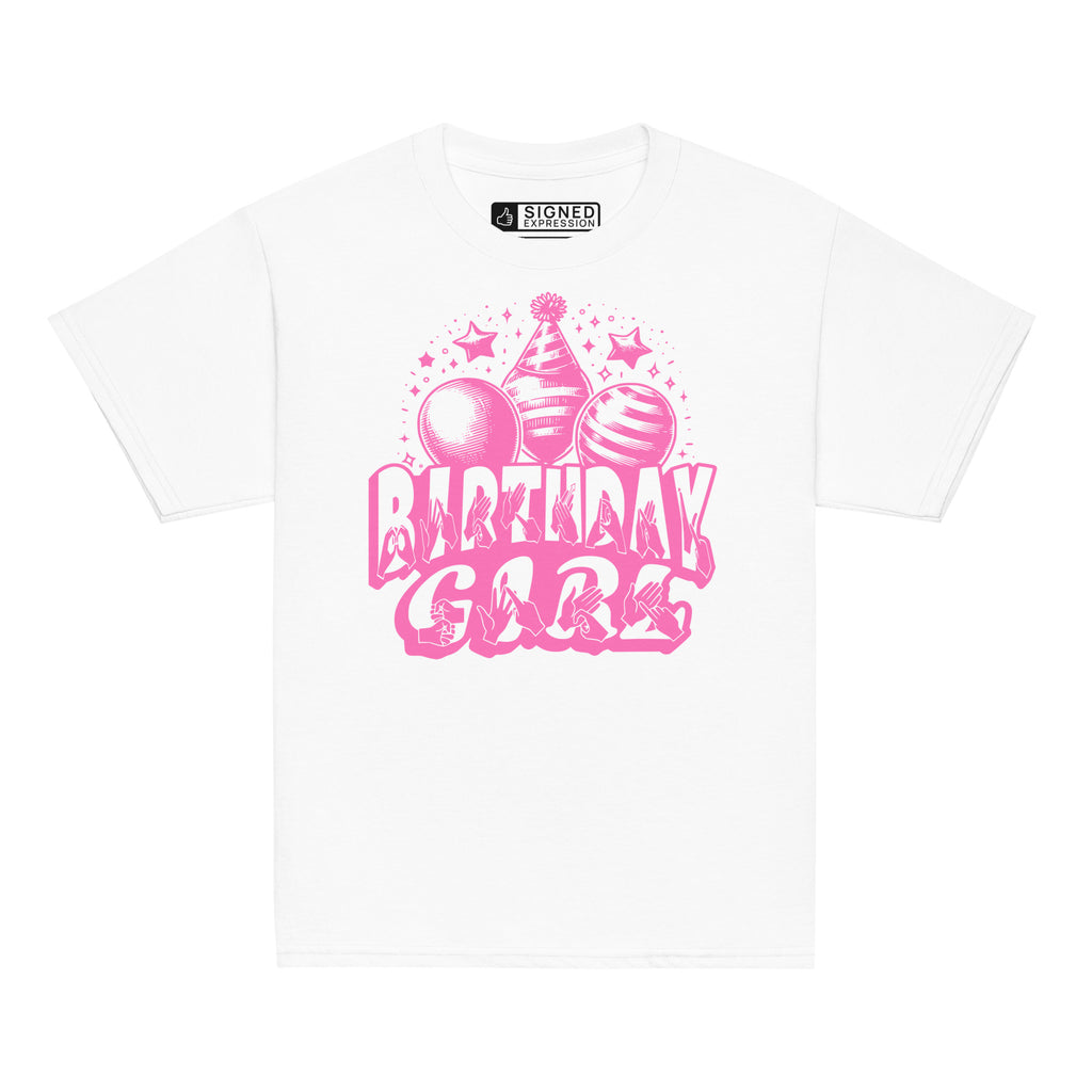 White kids' t-shirt with "Birthday Girl" in bold letters featuring British Sign Language fingerspelling, with pink balloons, stars, and a party hat above.