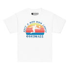 White t-shirt with the phrase "Just a Boy Who Loves Football" in BSL Fingerspelling and text featuring a colourful retro sunset and a silhouette of a boy kicking a football.