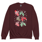 Maroon coloured Merry Christmas sweatshirt saying HO HO HO in BSL fingerspelling.